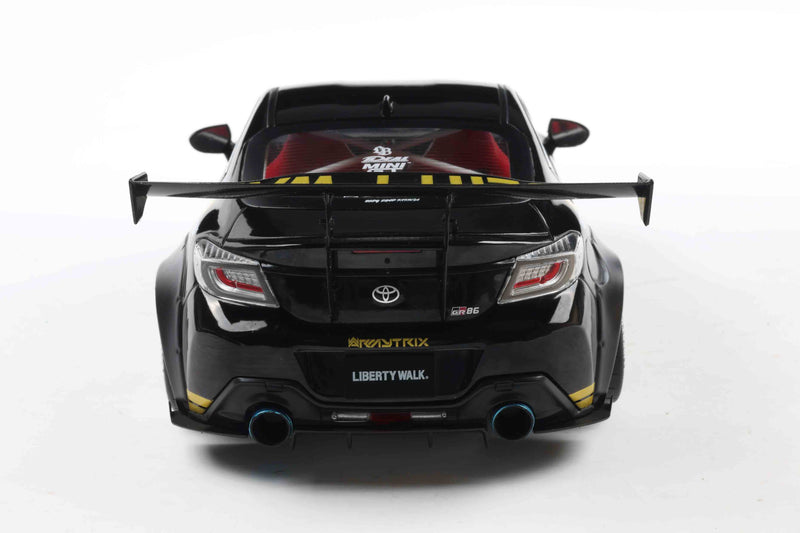 Laad de afbeelding in de Gallery-viewer, Toyota GR86 LIBERTY WALK CARROSSERIESET ZWART &amp; GOUD 2024 SOLIDO 1:18
