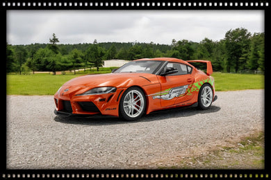 Toyota GR SUPRA TRIBUTE ORANJE 2024 SOLIDO 1:18