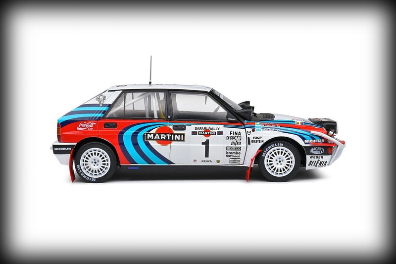 Load image into Gallery viewer, Lancia DELTA HF INTEGRALE SAFARI RALLYE KENYA 1991 SOLIDO 1:18
