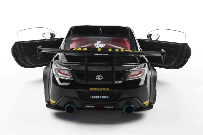 Laad de afbeelding in de Gallery-viewer, Toyota GR86 LIBERTY WALK CARROSSERIESET ZWART &amp; GOUD 2024 SOLIDO 1:18
