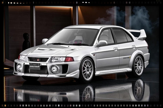 MITSUBISHI LANCER EVOLUTION V (CP9A) ARGENTÉ IGNITION MODEL 1:18