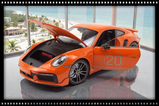Porsche 911 (992) Turbo S coupé Sport Design 2021 Orange MINICHAMPS 1:18