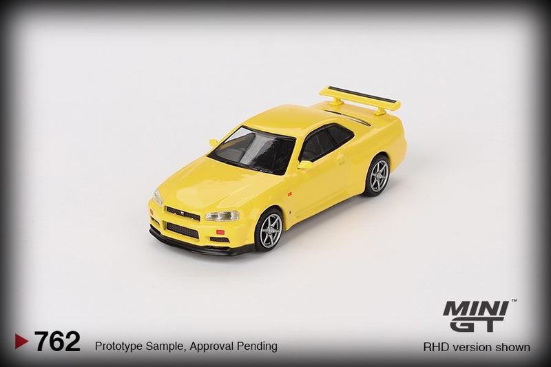 Load image into Gallery viewer, Nissan SKYLINE GT-R (R34) V- SPEC LIGHTNING YELLOW 1999 (RHD) MINI GT 1:64
