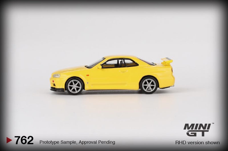 Load image into Gallery viewer, Nissan SKYLINE GT-R (R34) V- SPEC LIGHTNING YELLOW 1999 (RHD) MINI GT 1:64
