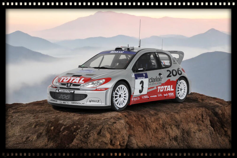 Load image into Gallery viewer, Peugeot 206 WRC PANIZZI TDC SILVER 2002 OTTOmobile 1:18

