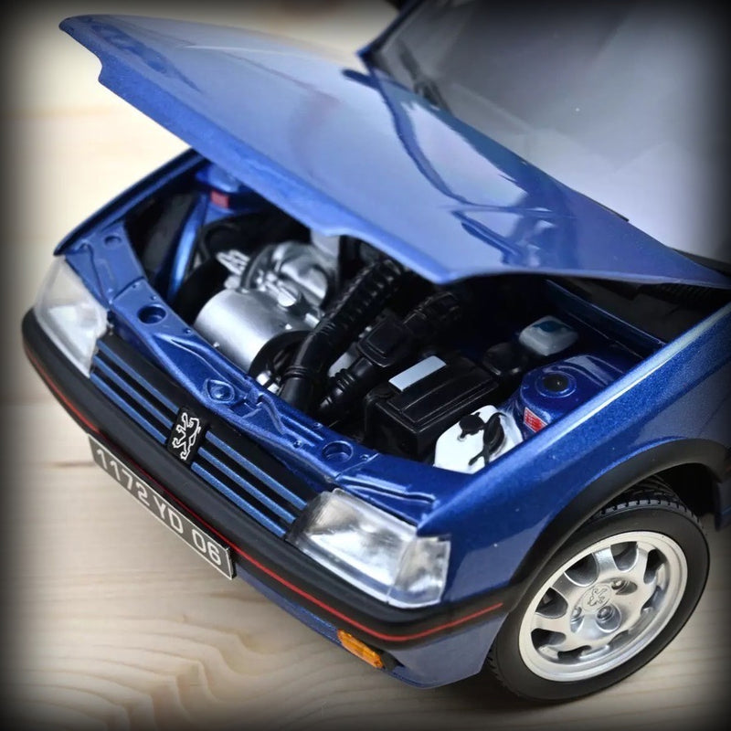 Laad de afbeelding in de Gallery-viewer, Peugeot 205 GTi 1.9 met open dak 1992 NOREV 1:18
