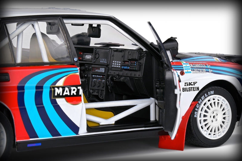 Load image into Gallery viewer, Lancia DELTA HF INTEGRALE SAFARI RALLYE KENYA 1991 SOLIDO 1:18
