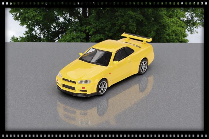 Nissan SKYLINE GT-R (R34) V- SPEC LIGHTNING YELLOW 1999 (RHD) MINI GT 1:64