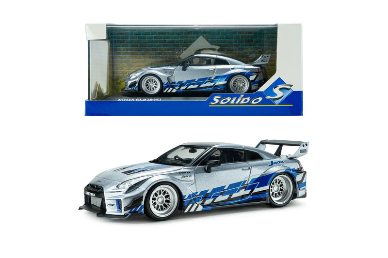 Laad de afbeelding in de Gallery-viewer, NISSAN GT-R (R35) LIBERTY WALK SILHOUETTE 2020 ZILVER EN BLAUWE STREPEN SOLIDO 1:43

