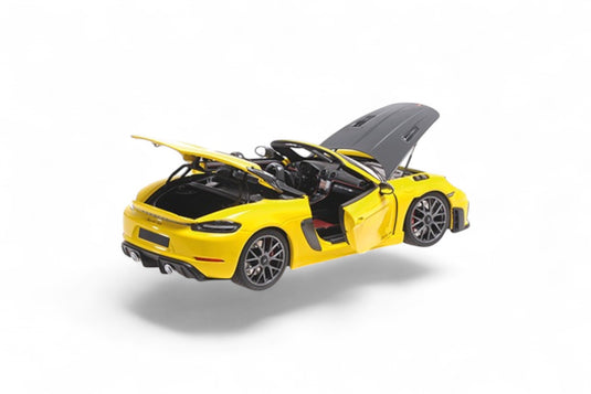 Porsche SPYDER RS 2024 GEEL MET WEISSACH PAKKET MINICHAMPS 1:18