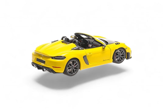 Porsche SPYDER RS 2024 GEEL MET WEISSACH PAKKET MINICHAMPS 1:18