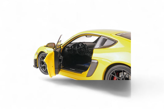 Porsche CAYMAN GT4 RS – 2024 -JAUNE AVEC PACK WEISSACH MINICHAMPS 1:18
