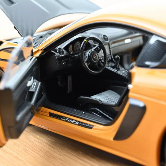 Porsche Cayman GT4 RS met pakket Weissach 2023 Geel NOREV 1:18