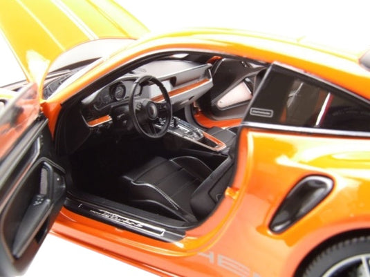 Porsche 911 (992) Turbo S coupe Sport Design 2021 Orange MINICHAMPS 1:18