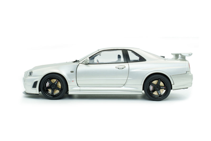 Laad de afbeelding in de Gallery-viewer, NISSAN SKYLINE (R34) GT-R Z TUNE ZILVER 1999 SOLIDO 1:18
