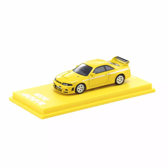 Nissan Skyline GT-R NISMO 400R R33 Jaune AVEC SYSTÈME LED 2003 + SYSTÈME DE BASE LED NOIR KYOSHO 1:64
