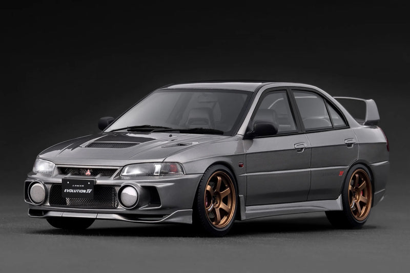 Chargez l'image dans la visionneuse de la galerie, MITSUBISHI LANCER EVOLUTION IV (CN9A) GRIS IGNITION MODEL 1:18
