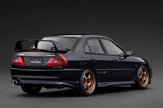 MITSUBISHI LANCER EVOLUTION IV (CN9A) NOIR IGNITION MODEL 1:18