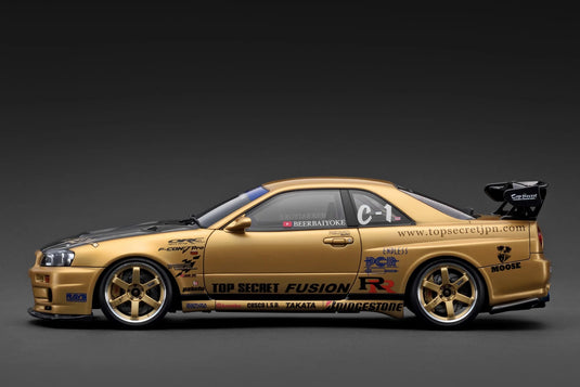 Nissan TOP SECRET 34GT-R (BNR34) Goud IGNITION MODEL 1:18