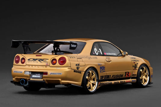 Nissan TOP SECRET 34GT-R (BNR34) Goud IGNITION MODEL 1:18