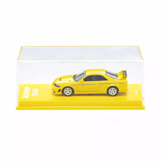 Nissan Skyline GT-R NISMO 400R R33 Jaune AVEC SYSTÈME LED 2003 + SYSTÈME DE BASE LED NOIR KYOSHO 1:64
