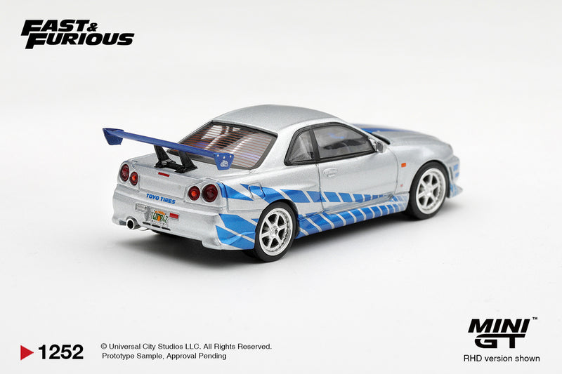 Load image into Gallery viewer, NISSAN SKYLINE GT-R (R34) C- WEST - 2 FAST 2 FURIOUS - BRIAN O'CONNER 2003 ‼️ONLY BLISTER PACK‼️ MINI GT 1:64

