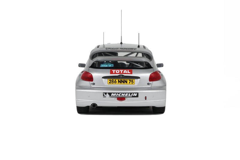 Load image into Gallery viewer, Peugeot 206 WRC PANIZZI TDC SILVER 2002 OTTOmobile 1:18

