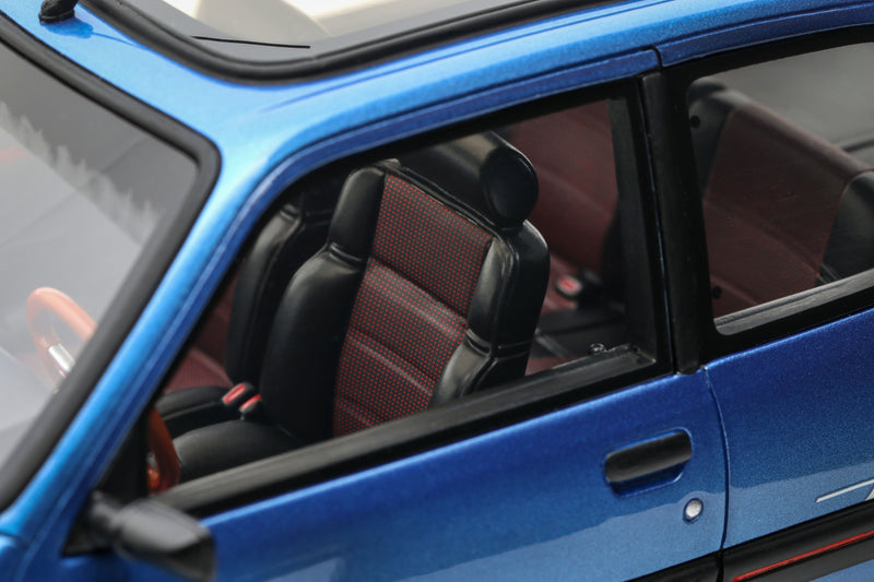 Laad de afbeelding in de Gallery-viewer, Peugeot 205 1.9 GTI LE MANS MIAMI BLAUW 1991 OTTOmobile 1:18
