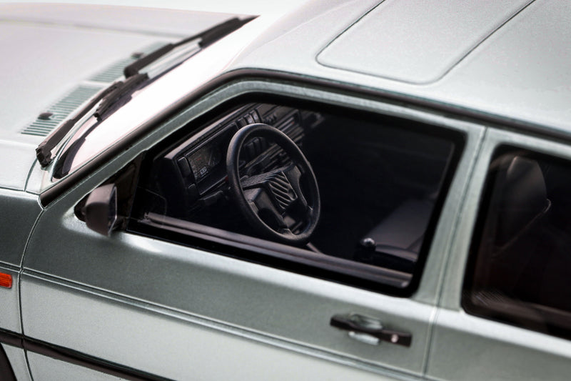 Load image into Gallery viewer, VOLKSWAGEN GOLF II GTI "STANCE" CALYPSO GREEN 1991 OTTOmobile 1:18
