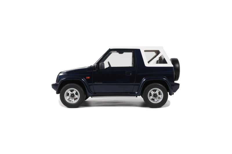Laad de afbeelding in de Gallery-viewer, Suzuki VITARA CABRIO JLX METAALBLAUW 1994 OTTOmobile 1:18
