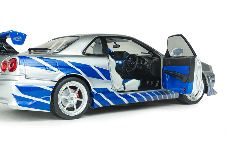 Laad de afbeelding in de Gallery-viewer, NISSAN SKYLINE GT-R (BNR34) 2FAST2FURIOUS BRIAN SOLIDO 1:18
