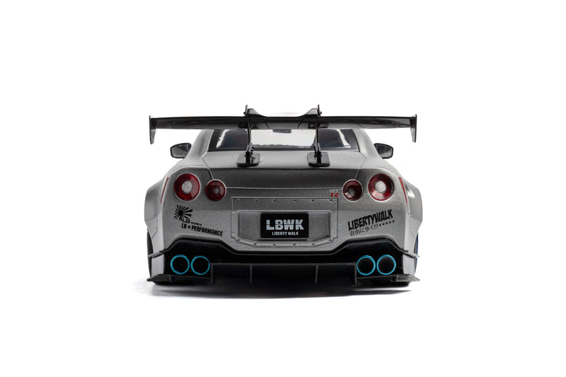 Chargez l'image dans la visionneuse de la galerie, NISSAN GT-R (R35) W/ LIBERTY WALK BODY KIT 2.0 ARGENTÉ 2023 SOLIDO 1:18
