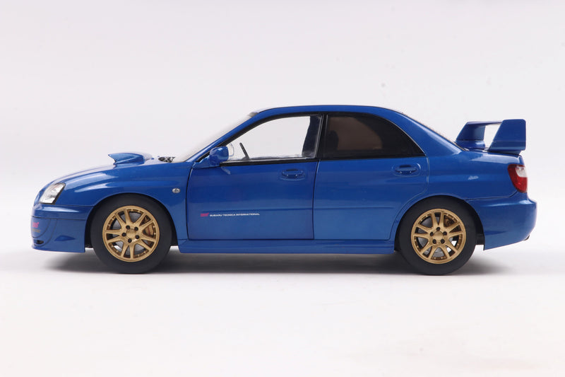 Laad de afbeelding in de Gallery-viewer, Subaru IMPREZA WRX STI SONIC BLAUW 2003 SOLIDO 1:18

