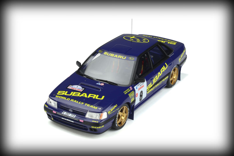 Laad de afbeelding in de Gallery-viewer, &lt;tc&gt;Subaru LEGACY Nr.8 COLLIN McRAE CORSE 1993 OTTOmobile 1:18&lt;/tc&gt;
