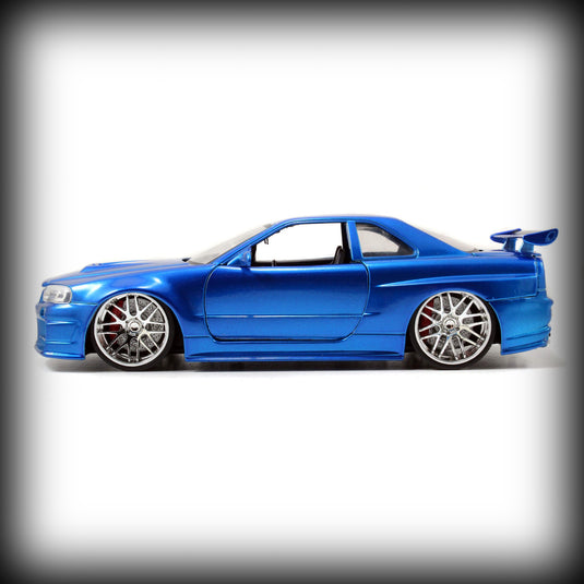 <tc>Nissan Skyline GT-R (BNR34) 2002 JADA 1:24</tc>